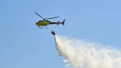 "24 сброса воды". Природный пожар потушили с помощью вертолёта в Жетысуской области