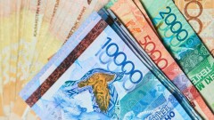 Кто заплатит за списание долгов казахстанцев