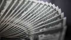 Чрезмерное использование доллара в политике ослабляет доверие к нему