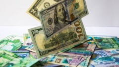 Демалыс күндері алдында доллар бағамы 450 теңгеден төмен түсті