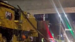 Гружёный трал заехал под конструкцию LRT в Астане: трое пострадали