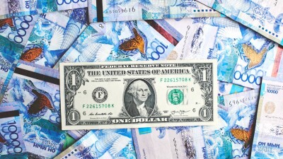 В АФК прогнозируют укрепление тенге к доллару к концу недели. За счёт чего?