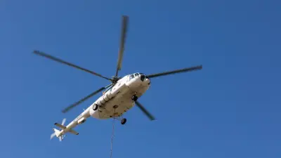 К тушению тростника в Атырауской области привлекли вертолёт, пожар локализовали