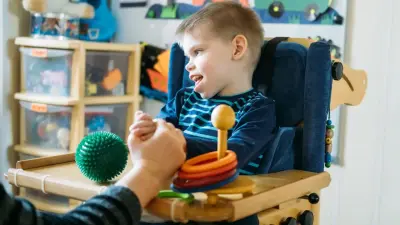 Уход за детьми с инвалидностью планируют включить в трудовой стаж казахстанцев