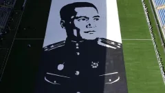 Портрет Бауыржана Момышулы размером с футбольное поле создали из детских рисунков в Астане