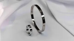 Изъятые браслет Cartier, кольцо с бриллиантом и ещё три изделия продали на аукционе