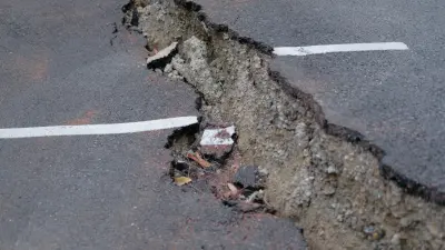 Асфальт частично провалился на одной из улиц Алматы из-за ливня