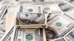 Курс доллара резко снизился к тенге на бирже 22 июля