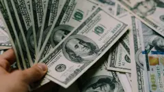 Курс доллара вырос к тенге на бирже 4 сентября