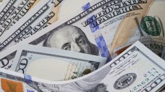 Тенге укрепился к доллару в январе, несмотря на покупку инвалюты Нацбанком на бирже