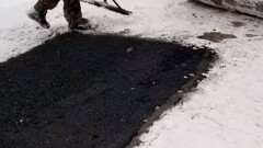 Замакима Талгара получил выговор за укладку асфальта на покрытый снегом тротуар