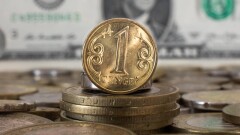 Тенге ещё немного укрепился к доллару на бирже перед выходными