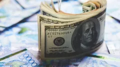 Курс доллара вырос к тенге на бирже 13 мая