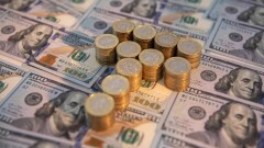 Курс доллара к тенге начал неделю на бирже со снижения