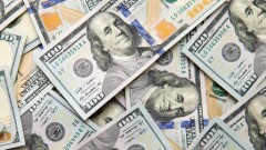Курс доллара на бирже вырос почти на 2 тенге перед выходными