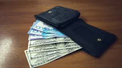 Покупка валюты для ЕНПФ может ослабить тенге в марте