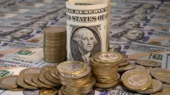 Курс доллара вырос к тенге на бирже на фоне падения цены на нефть