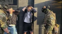 Инструкции обмана и флаг Казахстана изъяли у граждан Украины, организовавших сall-центр в Одессе