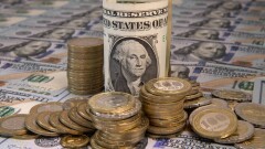 Курс доллара резко упал к тенге на биржевых торгах