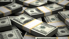 Курс доллара снизился к тенге на бирже