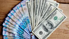 Курс доллара немного снизился к тенге на бирже 4 июня