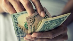 Курс доллара на бирже вырос почти на 13 тенге