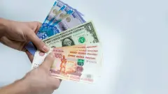 Курс доллара снизился к тенге на бирже 27 июля