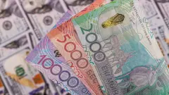 Курс доллара вырос к тенге на бирже 28 июля