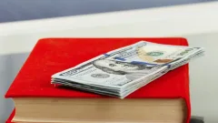 Курс доллара снизился к тенге на бирже 25 августа