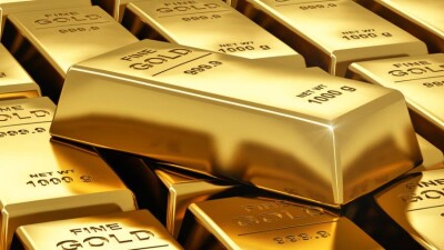 Цены на золото колеблются в преддверии заседания ФРС США