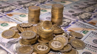 Тенге укрепился к доллару на биржевых торгах