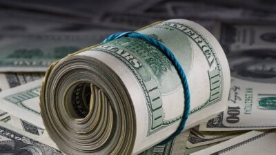 Доллар частично отыграл падение к тенге на бирже