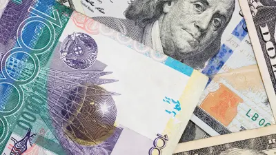 Курс доллара вырос почти на три тенге на бирже 14 апреля