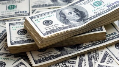 Тенге немного ослаб к доллару на KASE