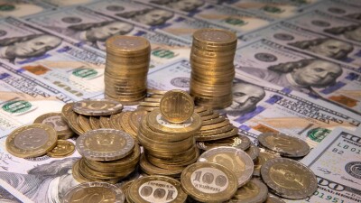 Тенге ещё немного укрепился к доллару на бирже