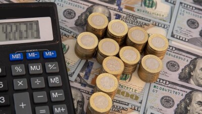 Курс доллара вырос к тенге на биржевых торгах