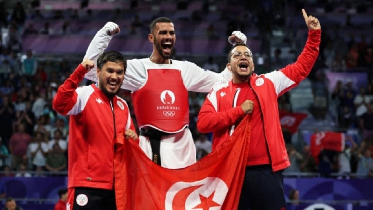 Есбол Сұлтанов пен шәкірті Фирас Катоуси / Фото: REUTERS/Tingshu Wang