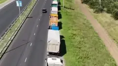 Большегрузы бросили на выезде из Петропавловска, чтобы избежать взвешивания: владельца арестовали