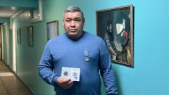 Школьного учителя из ВКО наградили за спасение детей из пожара