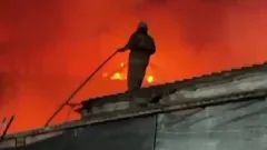 Административное здание горит в Алмалинском районе Алматы