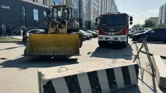 Шлагбаумы и бетонные ограждения проверяют во дворах Астаны