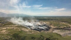 Возгорание на мусорном полигоне в Алматинской области: 500 тонн воды сбросили с вертолётов