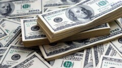 Нацбанк продлил срок действия установленных пределов между курсами покупки и продажи долларов до 1 июля