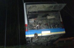 Маршрутный автобус повис на мосту в Алматы