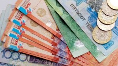 Тенге прощается с надписями на русском языке. Почему этот шаг необходим?