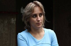 После угрозы самоподжога застройщик обязался вернуть дольщице в Астане вложенные в строительство деньги