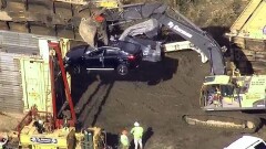 Сотня новых BMW превратилась в автохлам в результате крушения поезда
