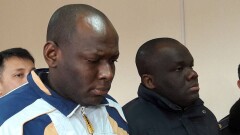 Шымкентский суд применил амнистию к "отбеливавшим" доллары нигерийцам