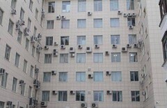 Казахстанцев заставят демонтировать кондиционеры и спутниковые антенны на фасадах домов