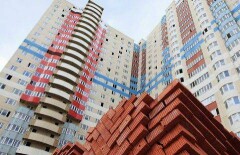 Новое жильё в Казахстане планируют продавать только за тенге 